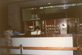 Photograph of the circulation desk in the Killam Memorial Library, Dalhousie University