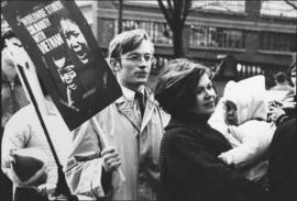 Photograph of Dalhousie sociology student, Chris Thurrott, with his wife and child, at an anti-Vi...