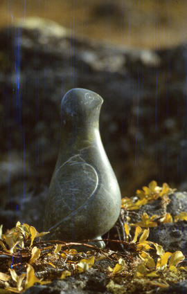 Photograph of a stone sculpture of a ptarmigan