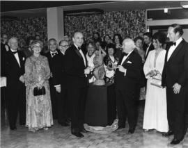 Photograph of Henry Hicks and guests at a reception