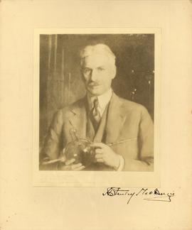 Photograph of a painting of A. S. MacKenzie as a scientist