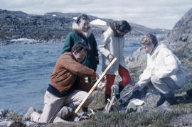 Photograph of Barbara Hinds and three other people with a kettle in Frobisher Bay, Northwest Terr...