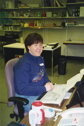 Photograph of Kelly Casey working at the Killam Memorial Library