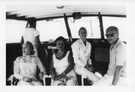 Photograph of Dorothy Johnston Killam on a boat with several unidentified people