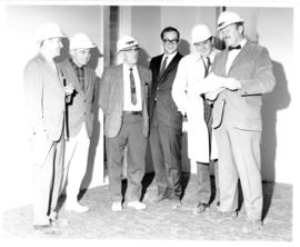 Photograph of six unidentified men in the Student Union Building