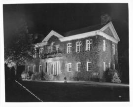 Photograph of the MacDonald Memorial Library at night