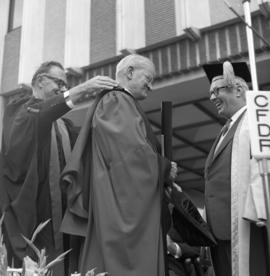 Photograph of Dr. Gordon B. Wiswell receiving an honorary degree
