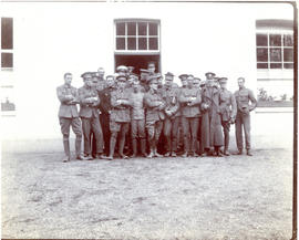 Photograph of a group of uniformed officers standing outside their quarters in Hythe, England