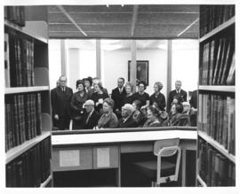 Photograph of an audience at the dedication of the Sir James Dunn Law Library