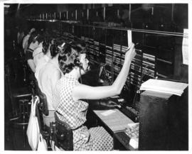 Photograph of operators removing tickets in Sydney