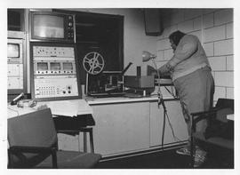 Photograph of an unidentified person in a television studio