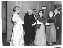 Photograph of C. D. Howe with unidentified guests at the opening ceremony of the Sir James Dunn B...