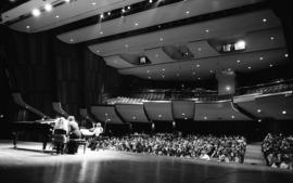 Photograph of a performance in the Rebecca Cohn Auditorium