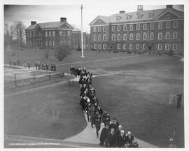 Photograph of a procession across Studley campus