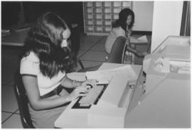 Photograph of the preparation of computer cards to permit data analysis in Dalhousie University's...