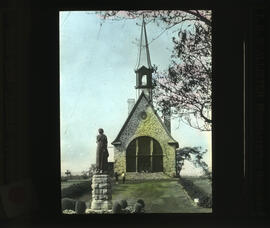Photograph of Longfellow's Evangeline statue and memorial church at Grand-Pré, Nova Scotia