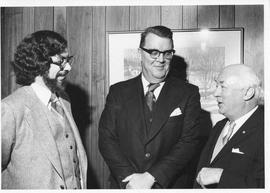 Photograph of MacKeigan, Henry Hicks, and an unidentified person