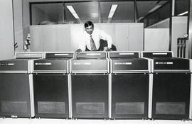 Photograph of Dalhousie Computer Centre Director Intab Ali with equipment