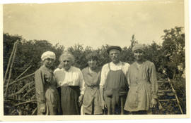 Photograph of a family in a garden