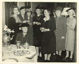 Ten unidentified women at a reception