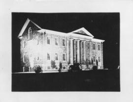 Photograph of the Arts Building at night