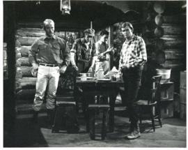 Photograph of the hunting scene with "Steve" (Jeremy Wilkin), "Indian Johnnie" (Eric Clavering), ...
