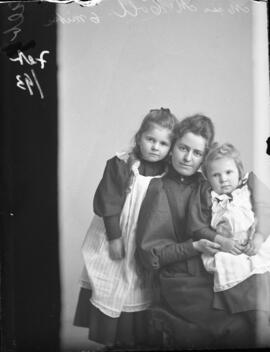 Photograph of Miss Annie McColl and two children