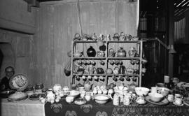 Photograph of a stand selling pottery at a craft market