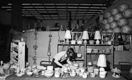 Photograph of a display of pottery at a craft market