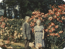Photograph of Nellie (née Raddall) and Maxwell Cassidy standing in a rose garden in Portland, Oregon