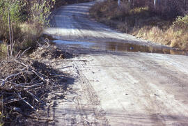 Photograph of a flooded access road to the Burwash mining site, near Sudbury, Ontario