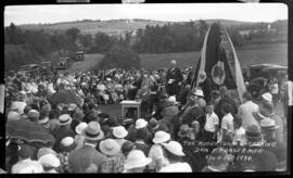 Photograph of Mr. Don F. Fraser M.P.P. speaking at the unveiling of the Cairn at the Robertson Ga...