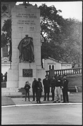 Photograph of veterans and anti-protesters standing in front of the War Memorial in Halifax's Gra...