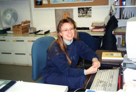 Photograph of Valerie Reashor in the Serials Department of the Killam Memorial Library