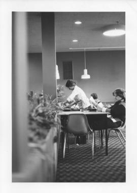 Photograph of a staff member in the Student Union Building cafeteria
