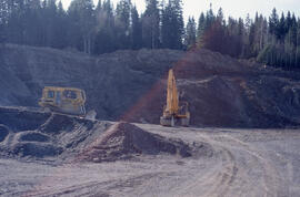 Photograph of gravel mining from an esker to pave forest roads in the Irving Black Brook District...