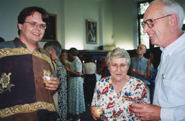 Photograph of Patricia Lutley and two unidentified guests at her retirement party