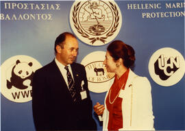 Photograph of two people at a Hellenic Marine Environment Protection Association (HELMEPA) event