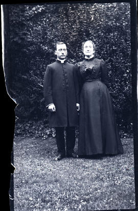 Man and woman standing together outside