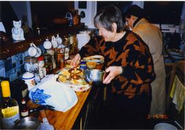 Photograph of Elisabeth Mann Borgese and an unidentified women in a kitchen