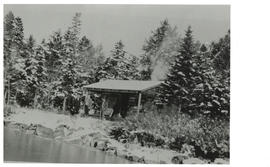 Photograph of three men at Geetpoo Lodge in winter