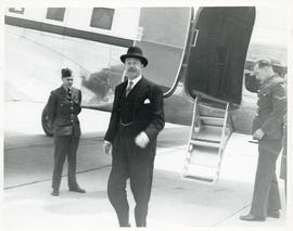 Photograph of Viscount Alexander of Tunis exiting an airplane