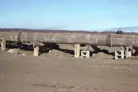 Photograph of wooden tailings pipes at the Copper Cliff site, near Sudbury, Ontario