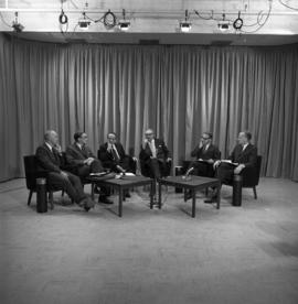 Photograph of a panel of six unidentified people