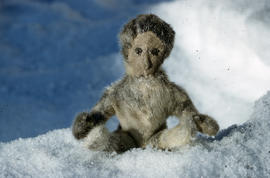 Photograph of a doll made of fur from Port Burwell, Northwest Territories
