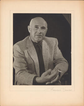 Photographic portrait of Thomas Head Raddall holding a cigarette