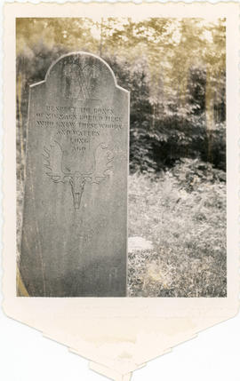 Photograph of a memorial stone in a Mi'kmaq cemetary at Kejimkujik Lake erected by architect Perc...