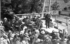 Photograph of E. N. Rhodes speaking to a crowd