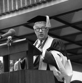 Photograph of Henry Hicks speaking at the Dalhousie medical centennial convocation ceremony