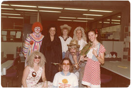 Photograph of Killam Library circulation desk employees in Hallowe'en costumes